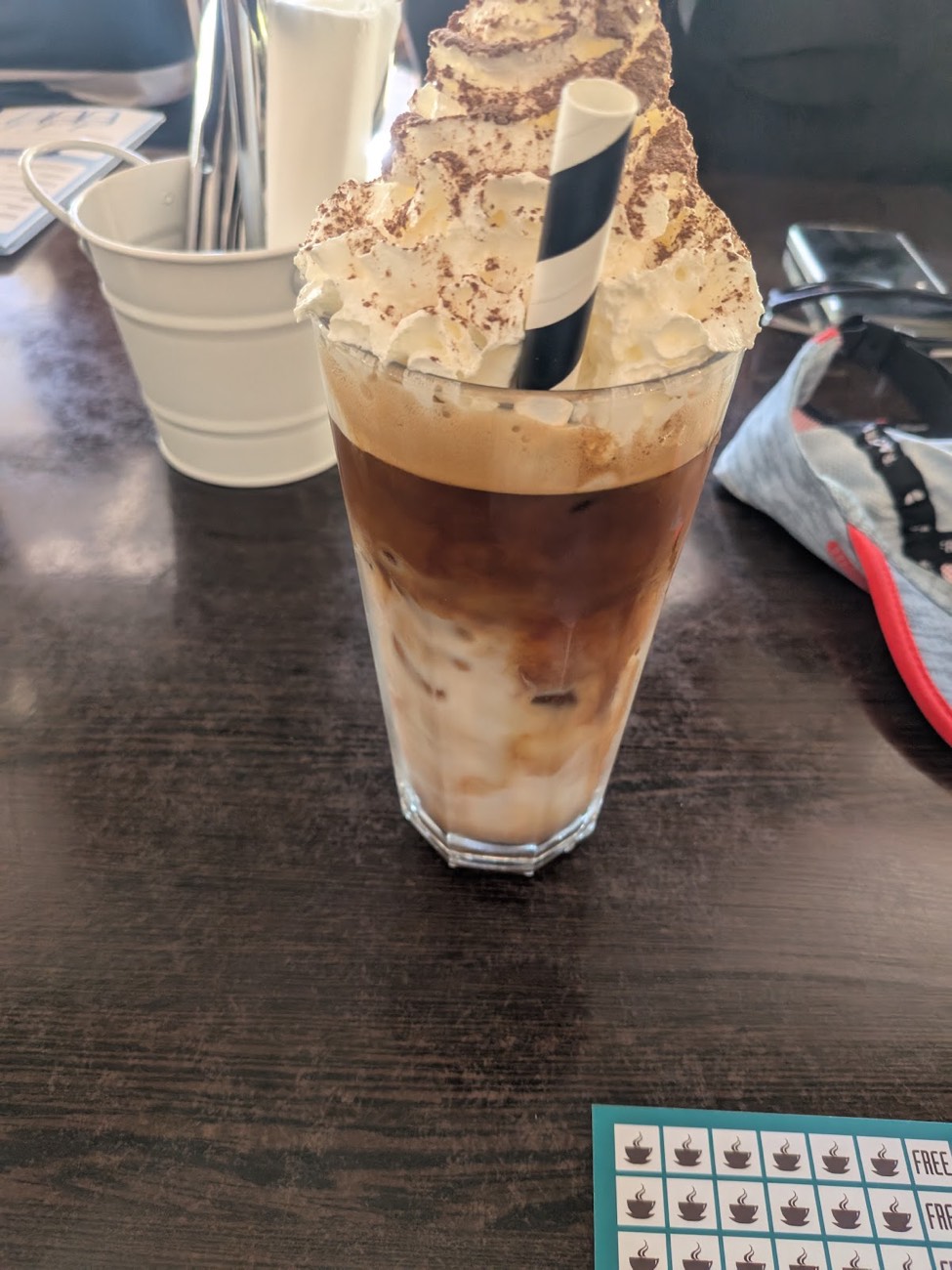 Iced coffee topped with cream